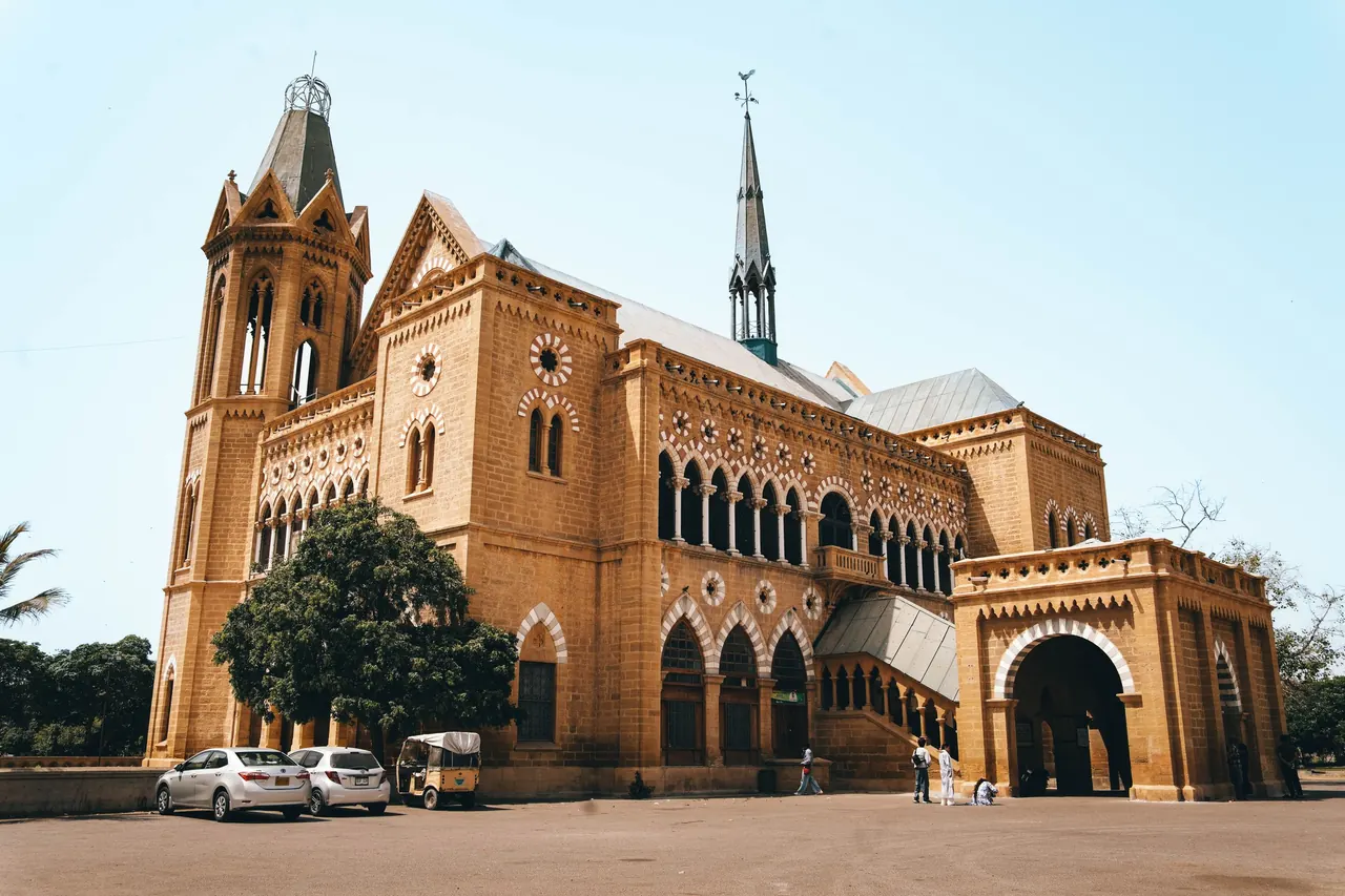A beautiful view of the gothic architecture of Frere Hall, a historic landmark in Karachi, Pakistan.